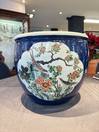 A Chinese famille verte blue-ground fishbowl with narrative design, 19th C.