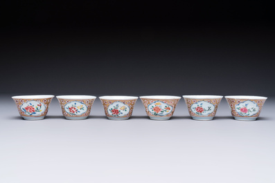 Six Chinese famille rose gilt-decorated 'Flower Basket' cups and saucers, Yongzheng/Qianlong