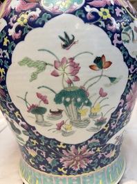 A large Chinese famille rose vase with lion-form handles and cover, 19th C.