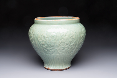 A fine large Chinese Longquan celadon 'Floral' jar, Ming