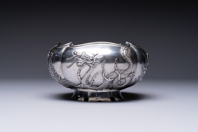 A fine Chinese silver bowl with relief dragon design on reticulated wooden stand, Tai Chang Long 泰昌隆 mark, 19th C.