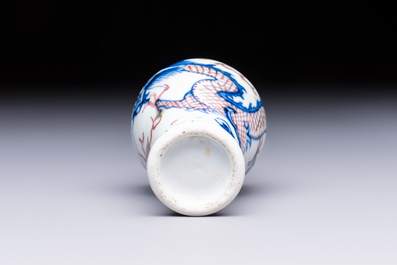 A Chinese blue, white and copper-red 'Dragon' snuff bottle, 19th C.
