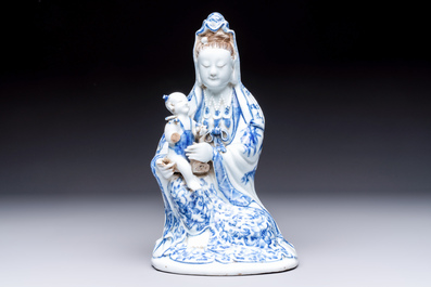 A Chinese blue and white 'Guanyin and child' group, Qianlong
