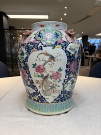 A large Chinese famille rose vase with lion-form handles and cover, 19th C.
