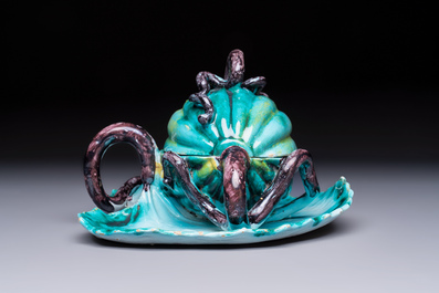 A very rare Brussels faience melon-shaped tureen and cover on stand, 18th C.