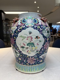 A large Chinese famille rose vase with lion-form handles and cover, 19th C.