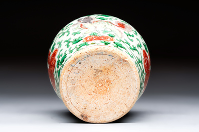 A small Chinese wucai 'Buddhist Lions and Peony Scrolls' jar, Transitional period