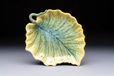A polychrome Dutch Delft melon-shaped tureen and cover on leaf-shaped stand, 18th C.