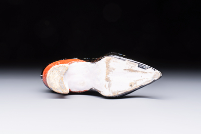 An extremely rare black Delftware model of a shoe, early 18th C.