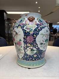 A large Chinese famille rose vase with lion-form handles and cover, 19th C.