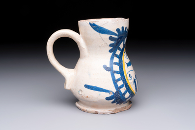 A very rare polychrome Antwerp maiolica 'IHS' jug, 16th C.