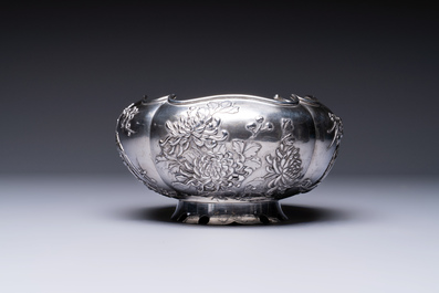 A fine Chinese silver bowl with relief dragon design on reticulated wooden stand, Tai Chang Long 泰昌隆 mark, 19th C.