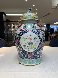 A large Chinese famille rose vase with lion-form handles and cover, 19th C.