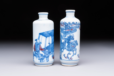 Two Chinese blue, white and copper-red snuff bottles with narrative design, 19th C.