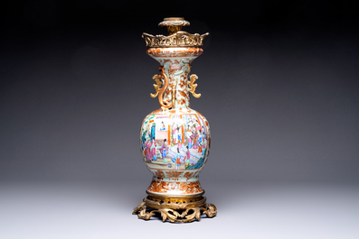 A gilt-bronze-mounted Chinese Canton famille rose celadon-ground vase, 19th C.