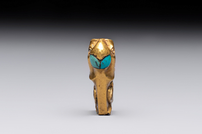A rare Chinese turquoise- and glass-inlaid gold fitting in the form of a parrot, Han