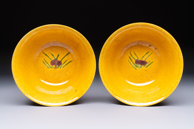 A rare pair of Chinese sancai yellow-ground 'Brinjal' bowls, Tianqi mark, 19th C.