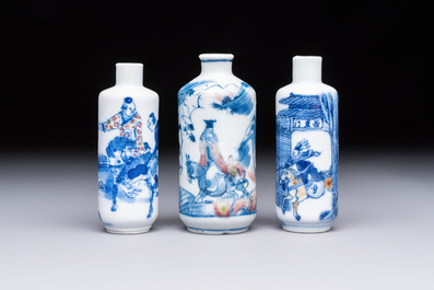 Three Chinese blue, white and copper-red snuff bottles with narrative design, 19th C.