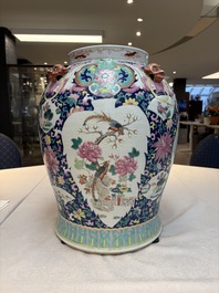 A large Chinese famille rose vase with lion-form handles and cover, 19th C.