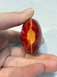 A Chinese 'Realgar Dragon' glass snuff bottle, probably from the imperial Beijing glass workshop, 1720-1840