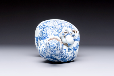 A Chinese blue and white 'Guanyin and child' group, Qianlong