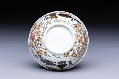 A Chinese gilt-decorated black-enamelled 'Antiquities' cup, Yongzheng/Qianlong