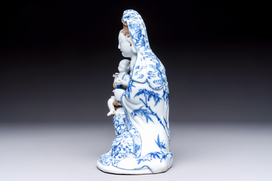 A Chinese blue and white 'Guanyin and child' group, Qianlong
