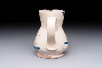 A very rare polychrome Antwerp maiolica 'IHS' jug, 16th C.