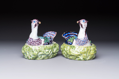 A pair of polychrome Dutch Delft 'Lapwings' tureens and covers, 18th C.