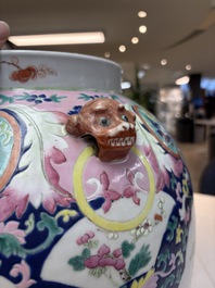A large Chinese famille rose vase with lion-form handles and cover, 19th C.