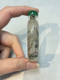 A Chinese rock crystal and two glass inside painted snuff bottles, 19/20th C., with a signed copy of 'Chinese Inside Painting of the Modern Age', 2005