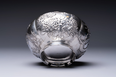 A fine Chinese silver bowl with relief dragon design on reticulated wooden stand, Tai Chang Long 泰昌隆 mark, 19th C.