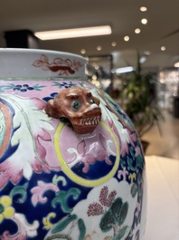 A large Chinese famille rose vase with lion-form handles and cover, 19th C.