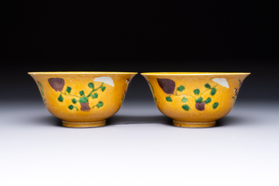 A rare pair of Chinese sancai yellow-ground 'Brinjal' bowls, Tianqi mark, 19th C.