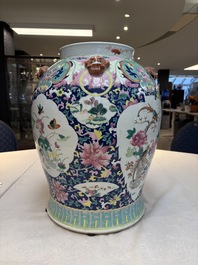 A large Chinese famille rose vase with lion-form handles and cover, 19th C.
