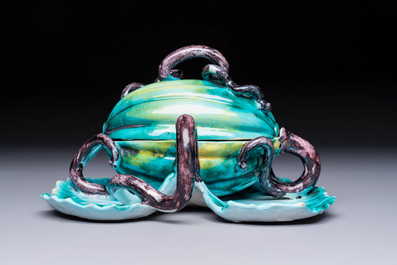 A very rare Brussels faience melon-shaped tureen and cover on stand, 18th C.