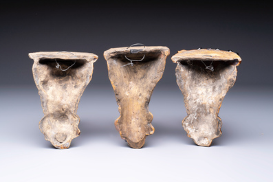 Three rare Bruges faience 'Faux Marble' and brown-glazed wall consoles, Pulinckx workshop, 18th C.