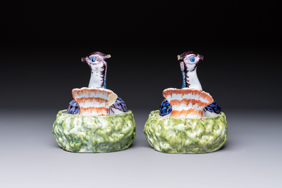 A pair of polychrome Dutch Delft 'Lapwings' tureens and covers, 18th C.