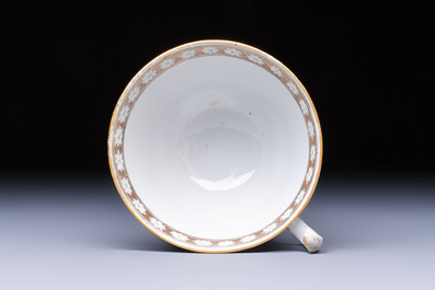 A Chinese Canton famille rose 'Rockefeller Pattern' cup and saucer, 19th C.
