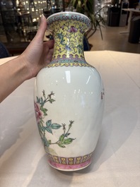 Seven Chinese famille rose vases, a scroll jar and a jardini&egrave;re on a stand, Qianlong marks, 20th C.