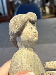 Two Chinese polychrome pottery figures and a female head, Tang