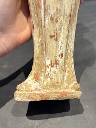 Two Chinese polychrome pottery figures and a female head, Tang