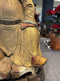 A large Chinese gilt-lacquered and polychrome wooden figure of Guandi, 19th C.