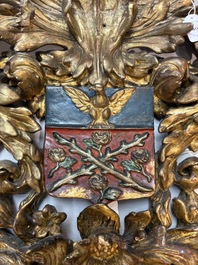A baroque gilt carved wooden panel with an unidentified family crest, possibly Germany, 18th C.