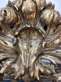 A baroque gilt carved wooden panel with an unidentified family crest, possibly Germany, 18th C.