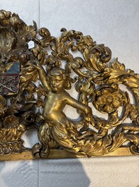 A baroque gilt carved wooden panel with an unidentified family crest, possibly Germany, 18th C.