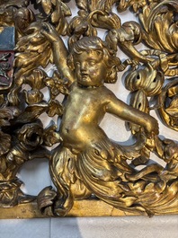 A baroque gilt carved wooden panel with an unidentified family crest, possibly Germany, 18th C.