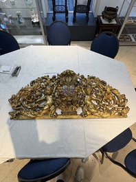 A baroque gilt carved wooden panel with an unidentified family crest, possibly Germany, 18th C.