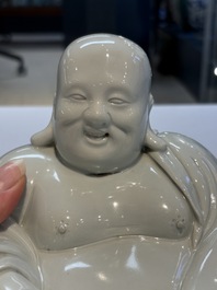 A fine Chinese white-glazed Milefo Buddha, 19th C.