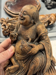 Six Chinese wooden and bamboo carvings, 19/20th C.